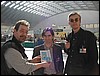 Benoit Peeters riceve la tessera di Socio Anonima Fumetti dal Presidente Gianfranco Goria; a destra Francois Schuiten - Torino Comics 2002, photo Goria